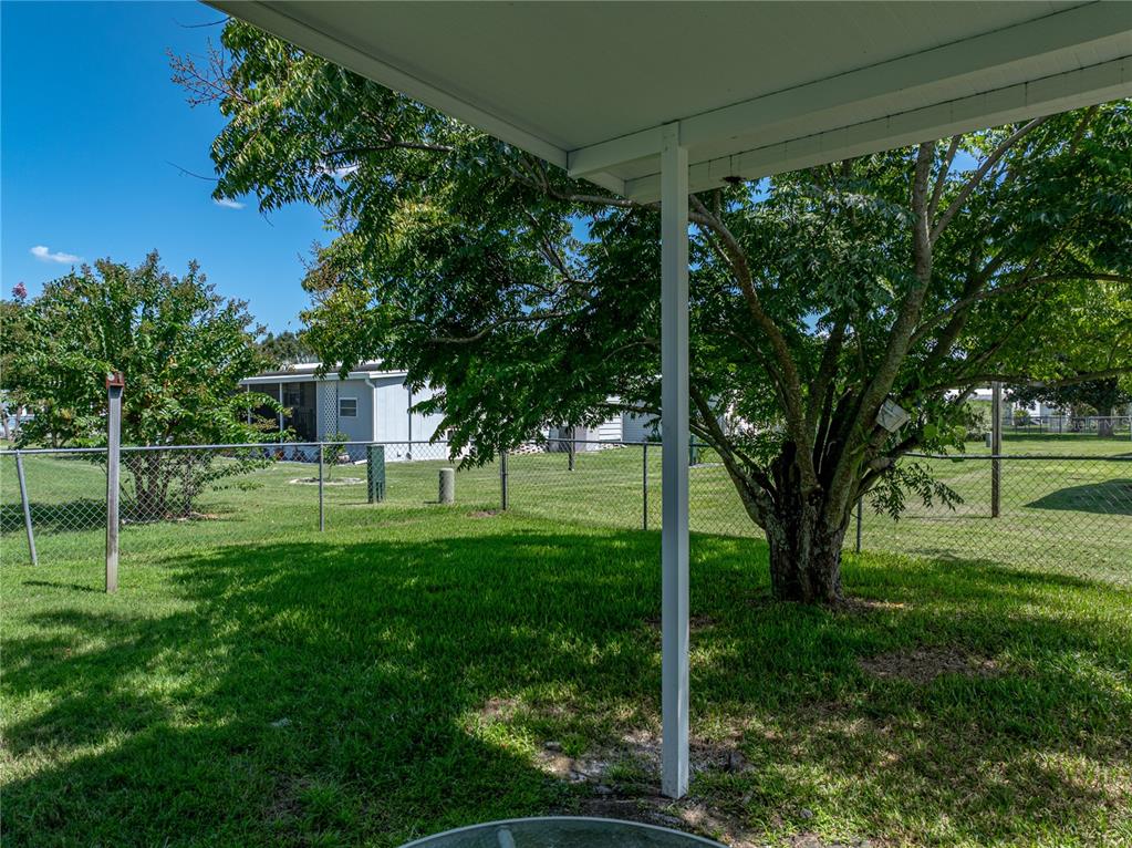 1610 Reynolds Road, Unit 35 Lakeland, FL 33801 - Photo 50 of 59 a view of a house with a backyard