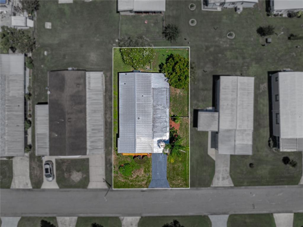 1610 Reynolds Road, Unit 35 Lakeland, FL 33801 - Photo 59 of 59 an aerial view of residential houses with outdoor space and street view