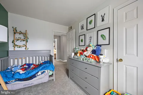 a bedroom with furniture and a bed