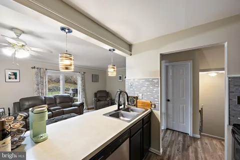 a view of a kitchen from a dining room