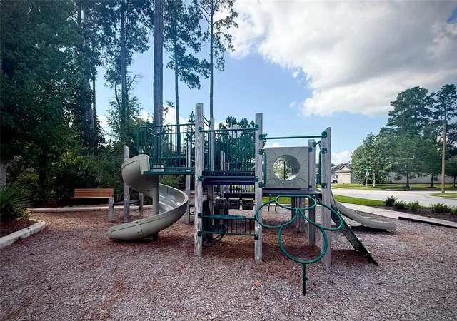 a house with trees in front of it