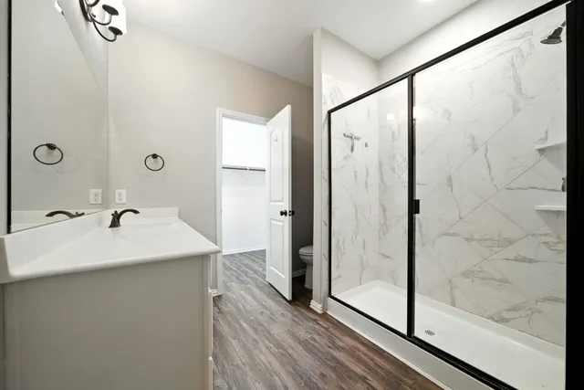a bathroom with a sink and mirror