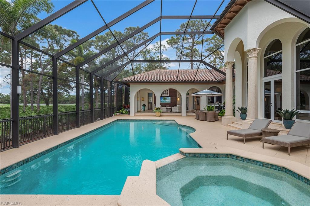 837 Barcarmil Way Naples, FL 34110 - Photo 38 of 38 a view of a house with swimming pool