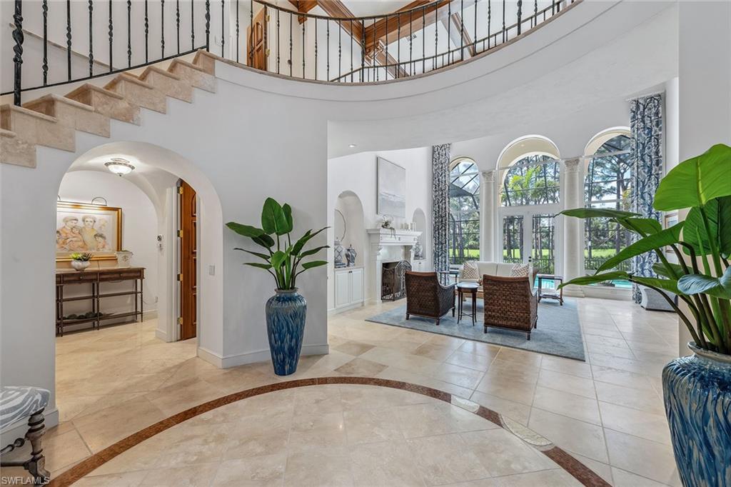 837 Barcarmil Way Naples, FL 34110 - Photo 4 of 38 a view of living room filled with furniture