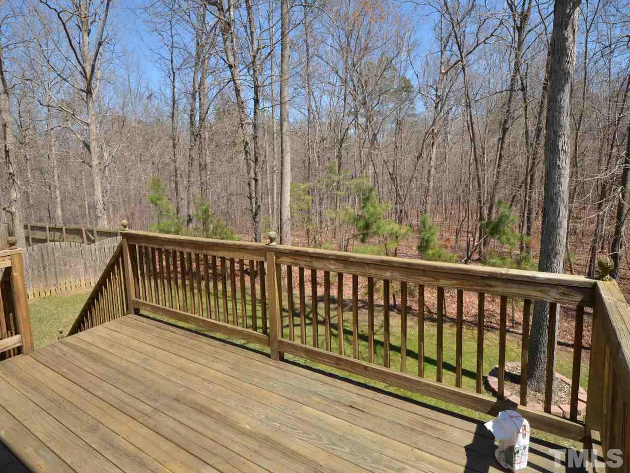 812 Nowell Ridge Road Raleigh, NC 27607 - Photo 16 of 21 a view of balcony with wooden floor and fence