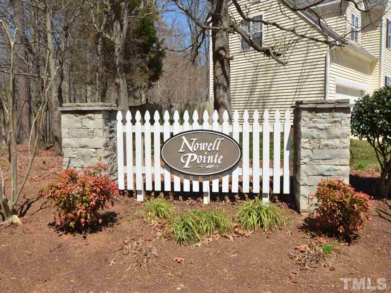 812 Nowell Ridge Road Raleigh, NC 27607 - Photo 3 of 21 a view of a house with a wooden bench