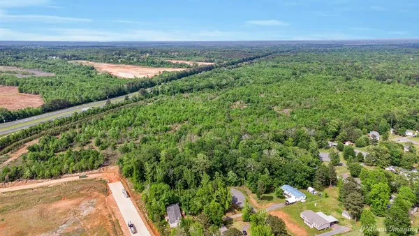 a view of a yard with an ocean