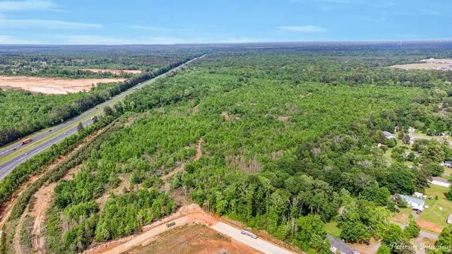 a view of a yard with an outdoor space