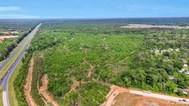 a view of a yard with an ocean view