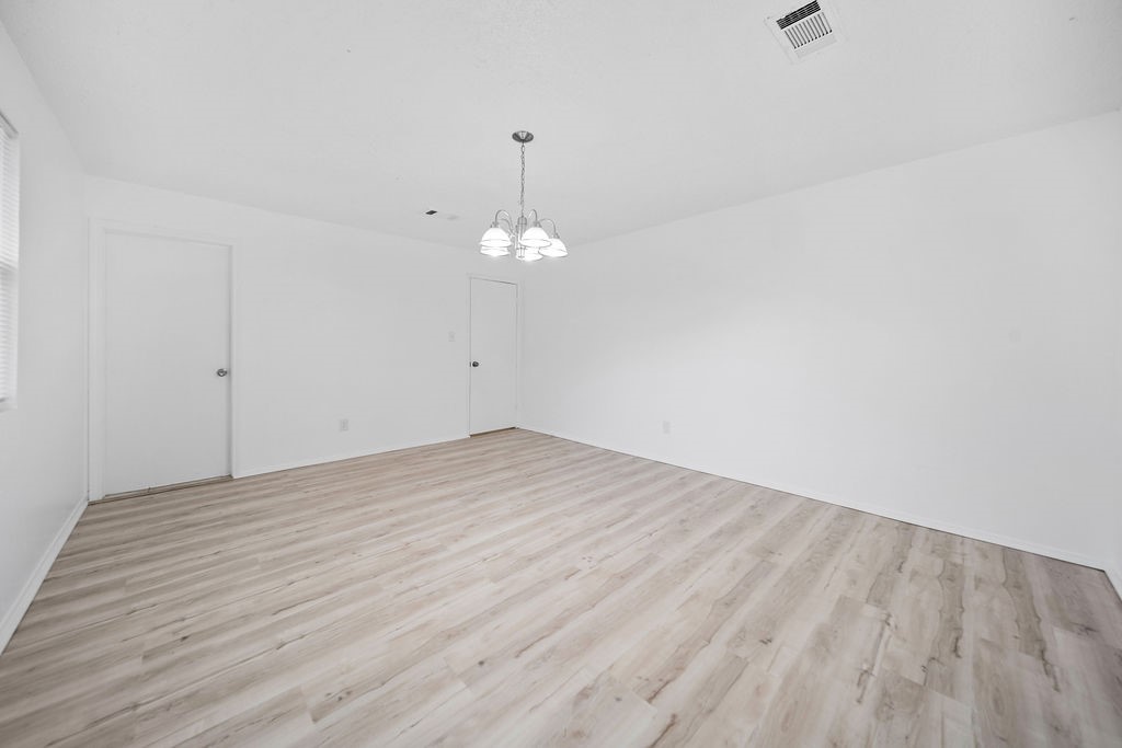 3058 Old Colony Road Huntsville, TX 77320 - Photo 15 of 25 wooden floor in an empty room