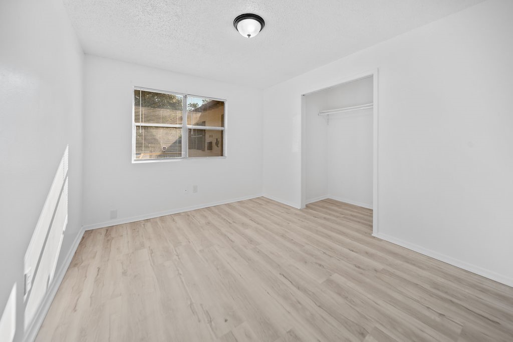 3058 Old Colony Road Huntsville, TX 77320 - Photo 18 of 25 an empty room with windows
