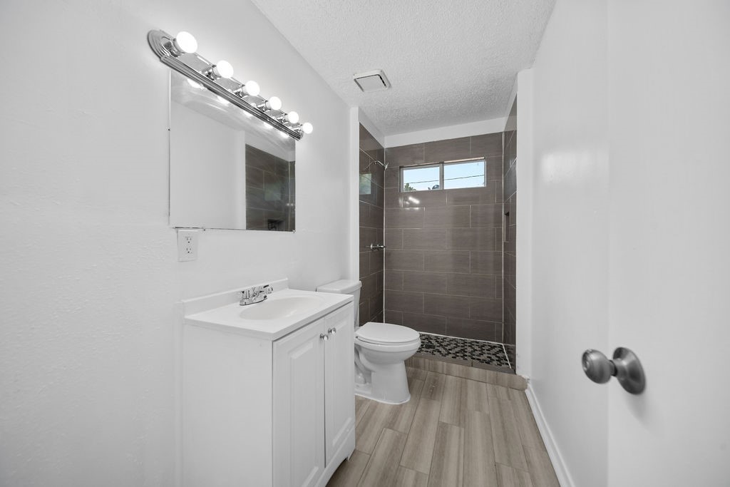 3058 Old Colony Road Huntsville, TX 77320 - Photo 19 of 25 a bathroom with a sink toilet and shower