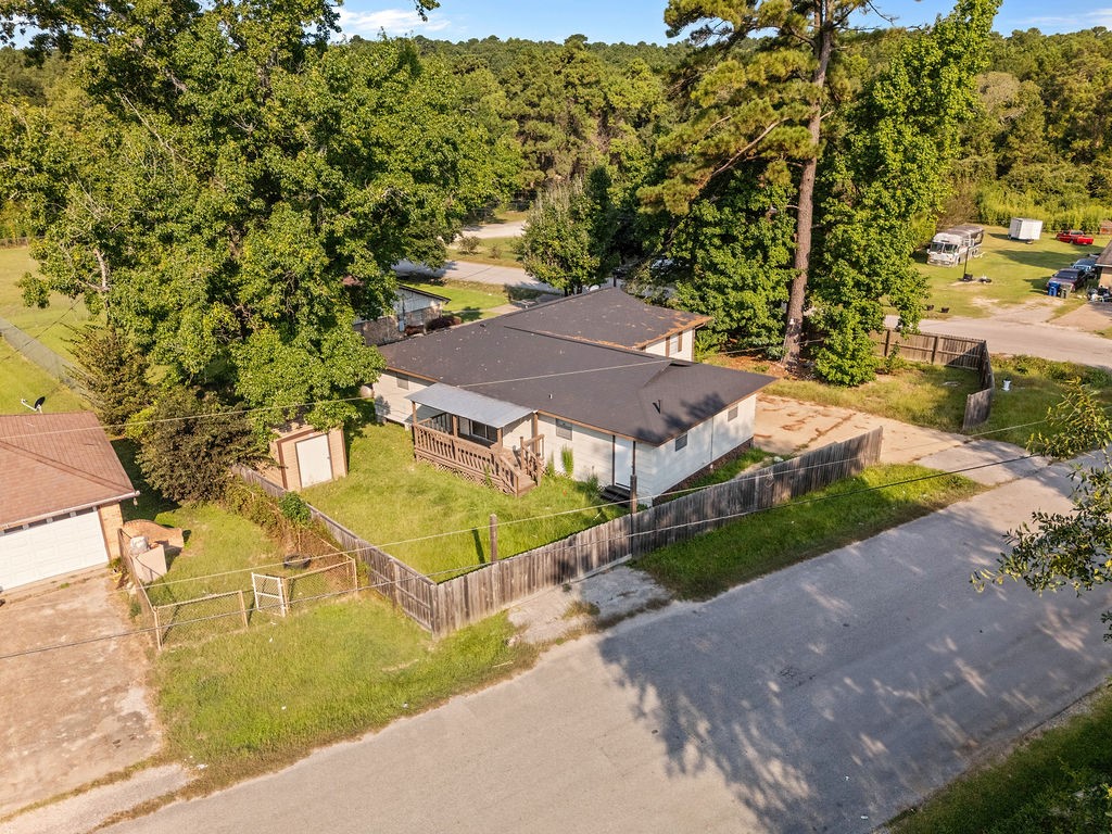 3058 Old Colony Road Huntsville, TX 77320 - Photo 22 of 25 an aerial view of residential houses with outdoor space