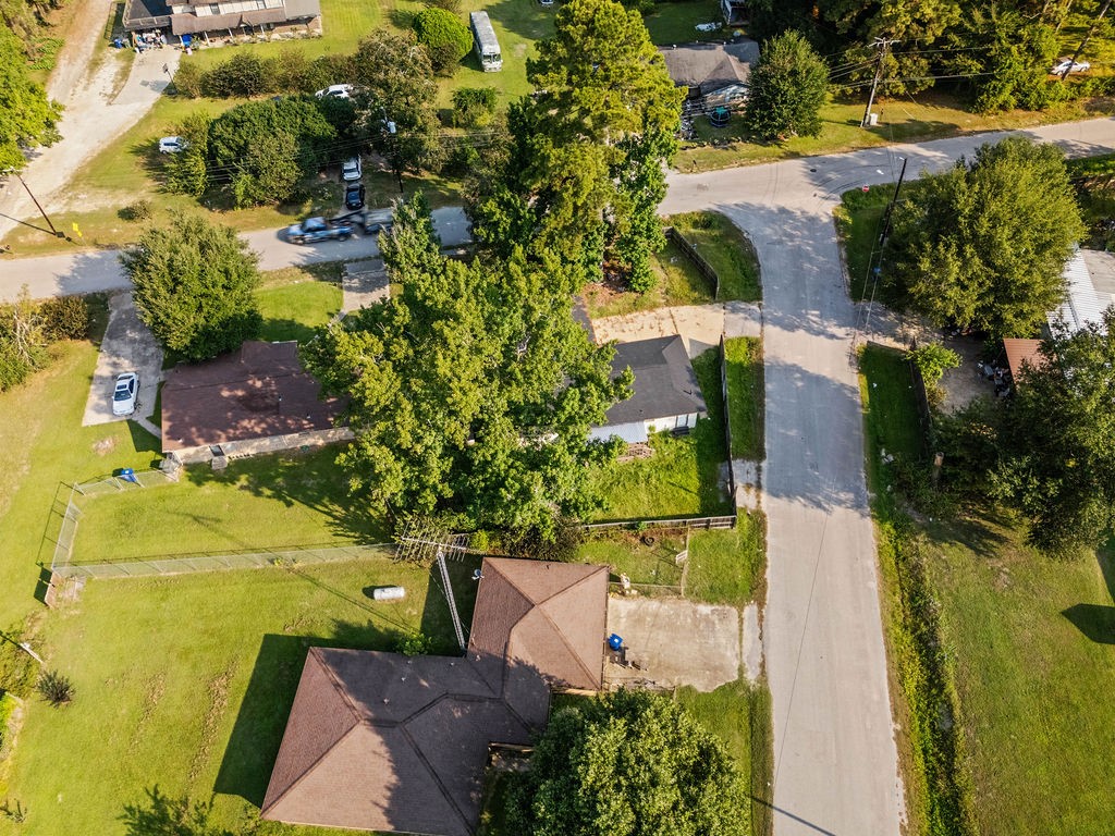 3058 Old Colony Road Huntsville, TX 77320 - Photo 24 of 25 an aerial view of a house with a yard basket ball court and outdoor seating