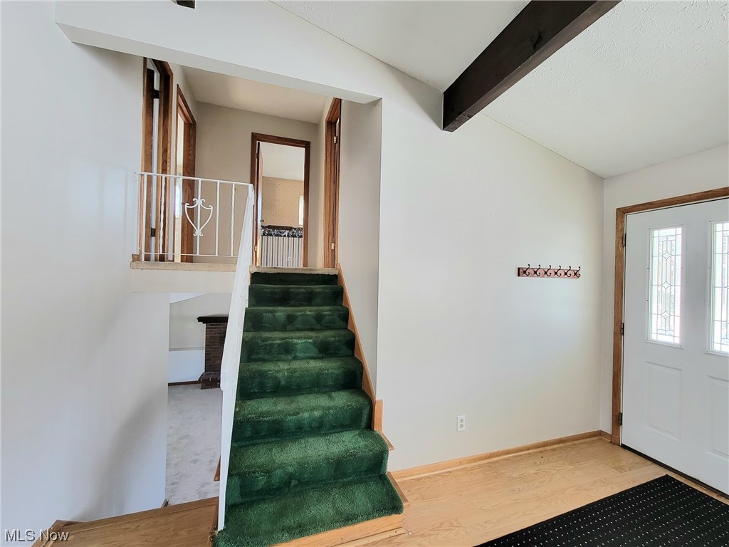 2821 Summit Road Akron, OH 44321 - Photo 7 of 24 Stairs going to upstairs 2nd floor and stairs going to lower level family room.