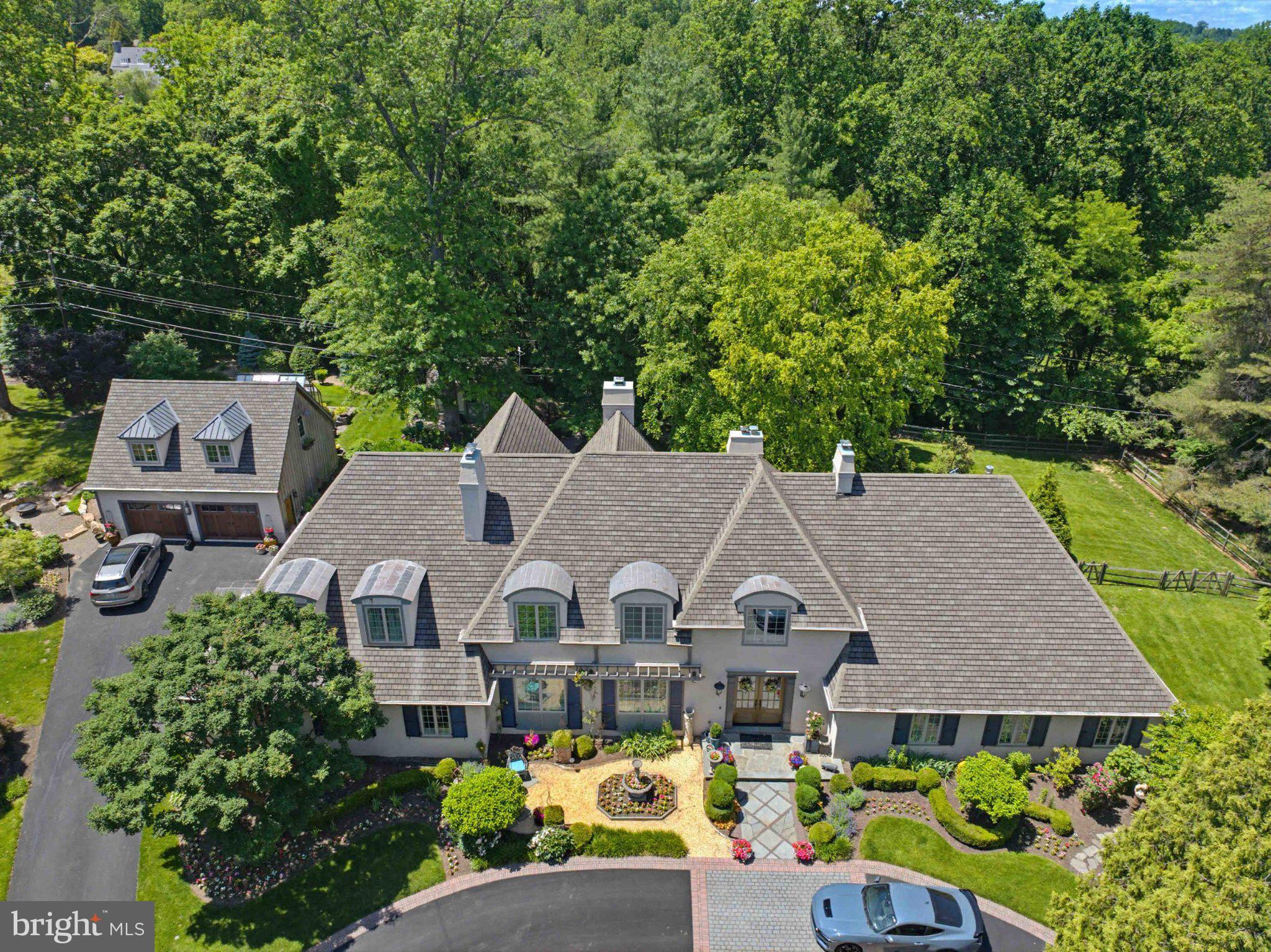 2244 Deer Path Road Huntingdon Valley, PA 19006 - Photo 2 of 95 Charming estate nestled in lush greenery.