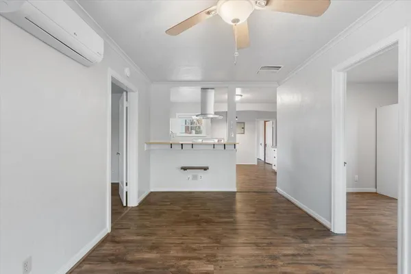 a view of kitchen with wooden floor