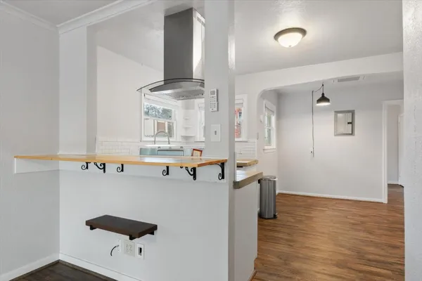 a view of a kitchen with appliances and cabinets