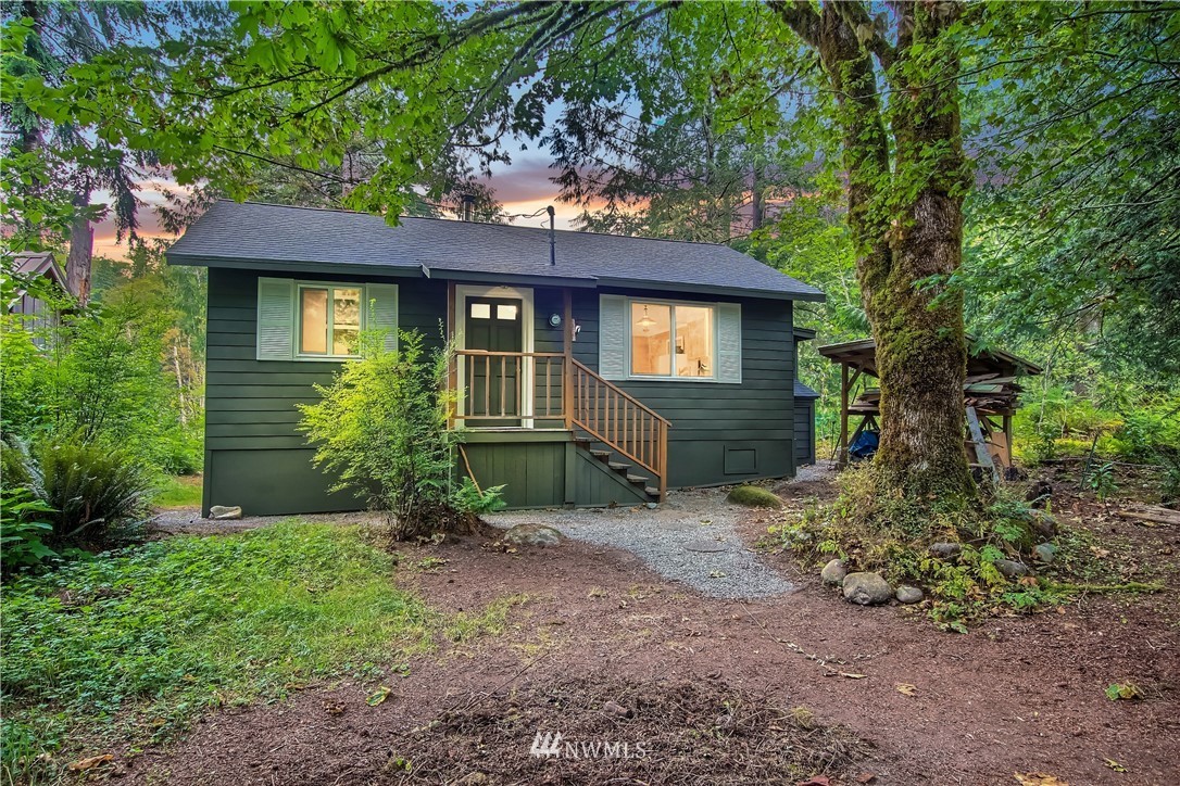 50229 Loop Road Gold Bar, WA 98251 - Photo 1 of 21 a front view of a house with garden