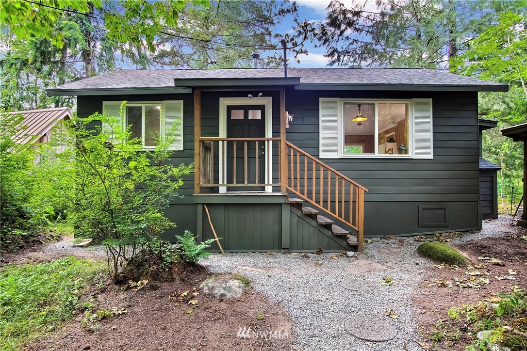 50229 Loop Road Gold Bar, WA 98251 - Photo 2 of 21 a view of a house with a yard and plants