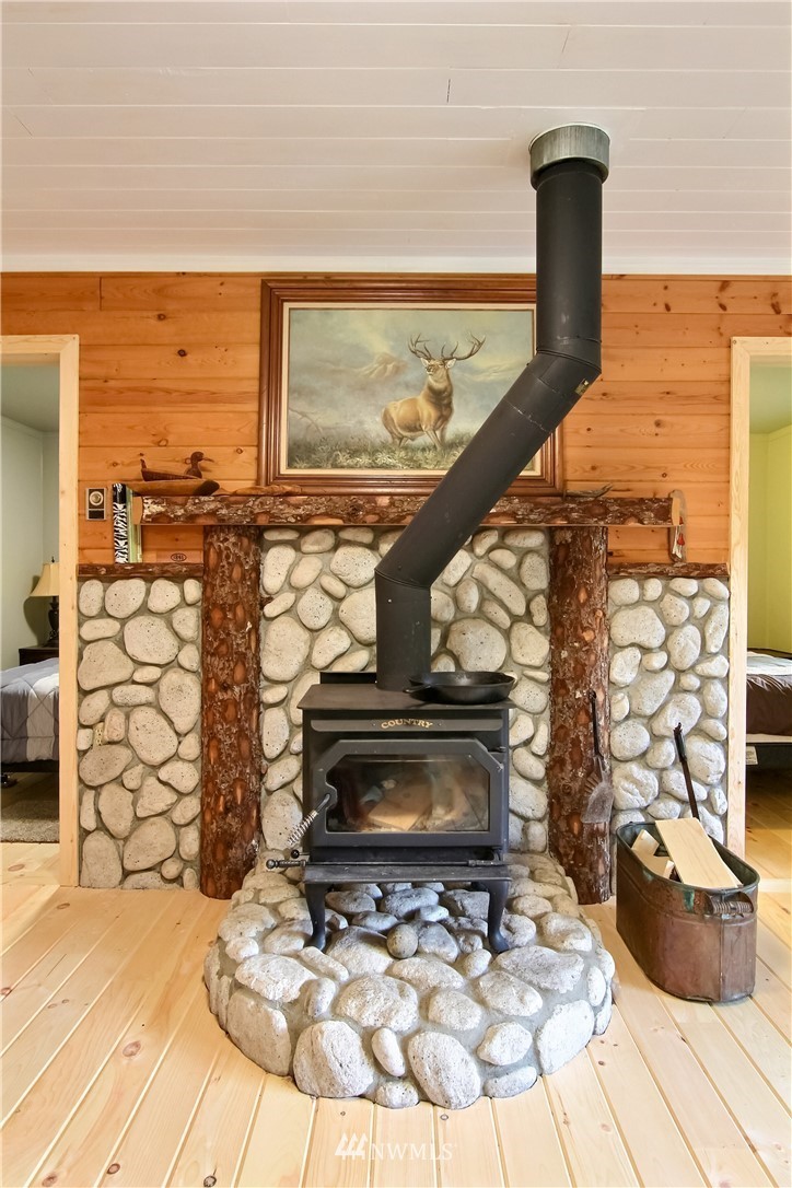 50229 Loop Road Gold Bar, WA 98251 - Photo 11 of 21 a view of living room with furniture and flat screen tv