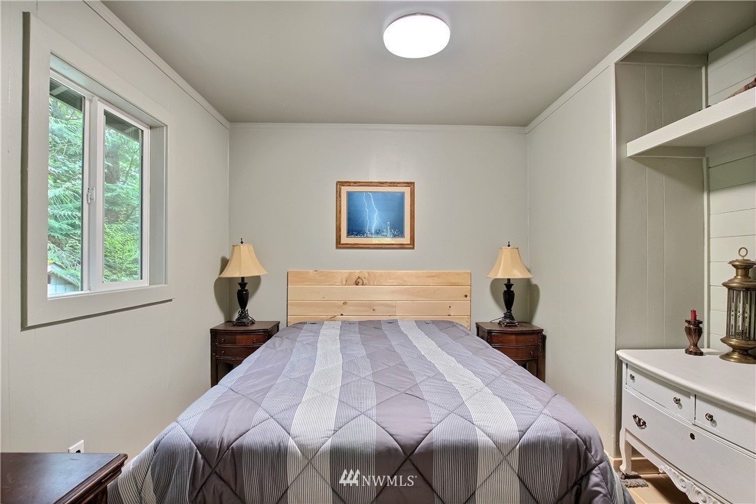 50229 Loop Road Gold Bar, WA 98251 - Photo 14 of 21 a bedroom with a bed and a window