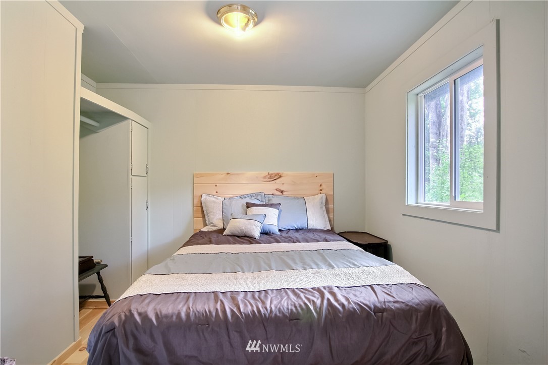 50229 Loop Road Gold Bar, WA 98251 - Photo 15 of 21 a bedroom with a bed and window