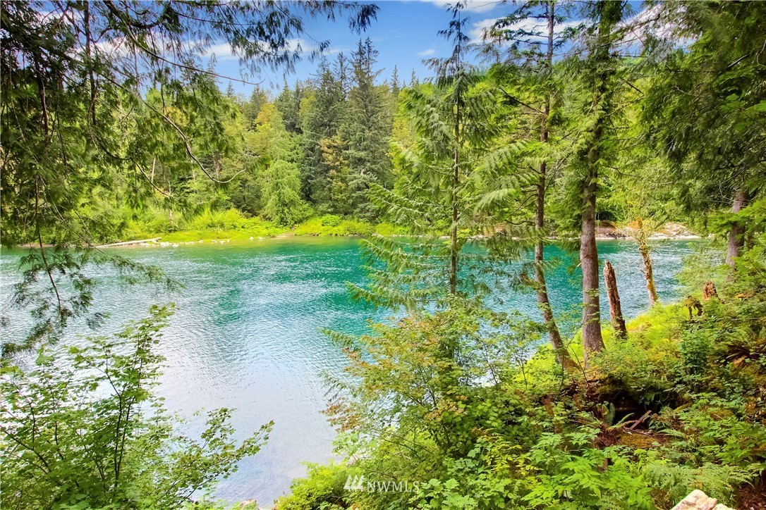 50229 Loop Road Gold Bar, WA 98251 - Photo 18 of 21 a view of a lake with a house