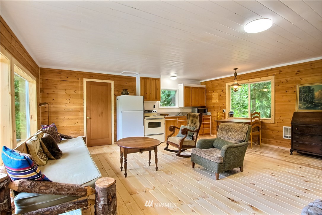 50229 Loop Road Gold Bar, WA 98251 - Photo 10 of 21 a living room with furniture and a table