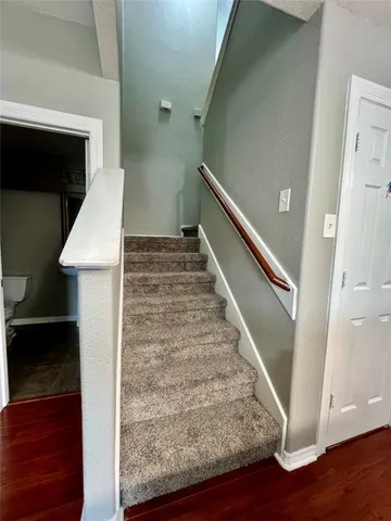 a view of entryway with wooden floor