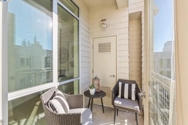 a balcony view with a couch