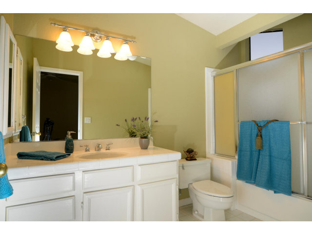 133 Redding Road, Unit B Campbell, CA 95008 - Photo 10 of 12 a bathroom with a sink a toilet and mirror