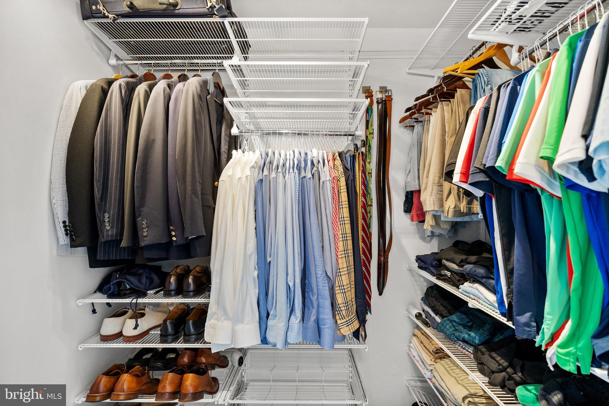 2500 Virginia Avenue Northwest, Unit 1005S Washington, DC 20037 - Photo 15 of 42 a view of walk in closet with clothes and shoes