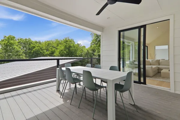 a view of swimming pool with a patio