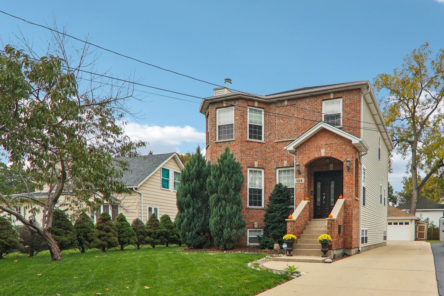 124 Hubbard Court Wauconda, IL 60084 - Photo 1 of 47 a front view of a house with a yard