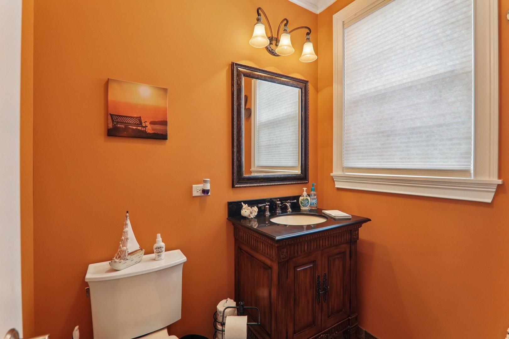 124 Hubbard Court Wauconda, IL 60084 - Photo 14 of 47 a bathroom with a sink a mirror and a toilet
