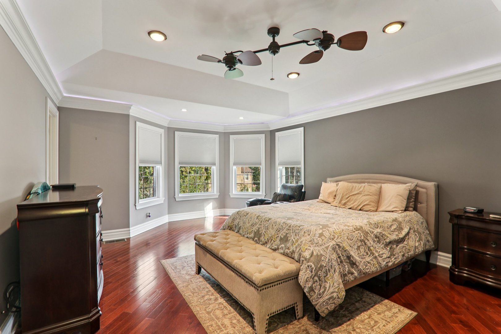 124 Hubbard Court Wauconda, IL 60084 - Photo 16 of 47 a bedroom with a bed and wooden floor