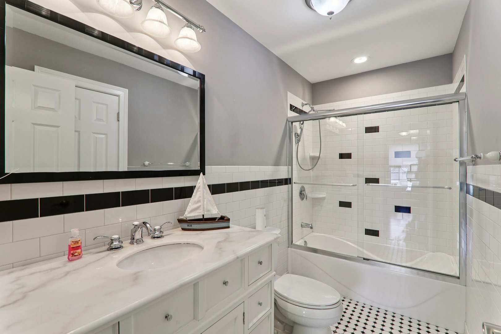 124 Hubbard Court Wauconda, IL 60084 - Photo 23 of 47 a bathroom with a sink a toilet and shower