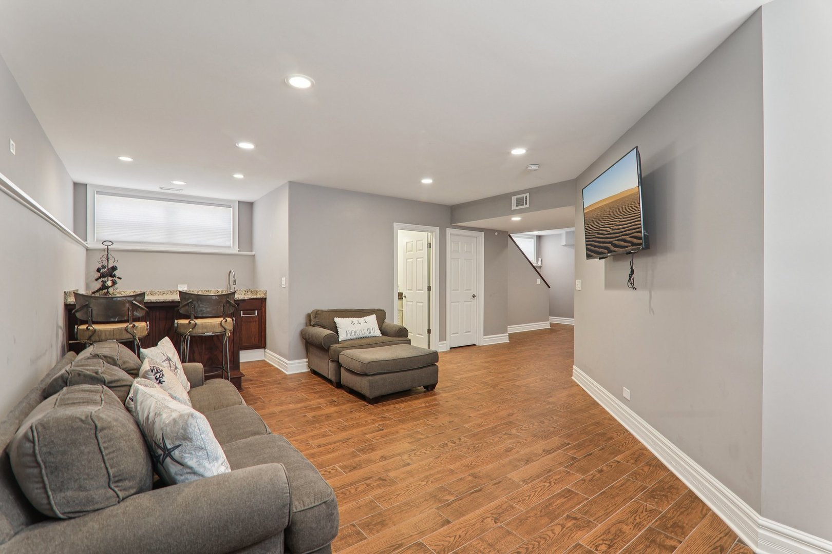 124 Hubbard Court Wauconda, IL 60084 - Photo 25 of 47 a living room with furniture and a flat screen tv