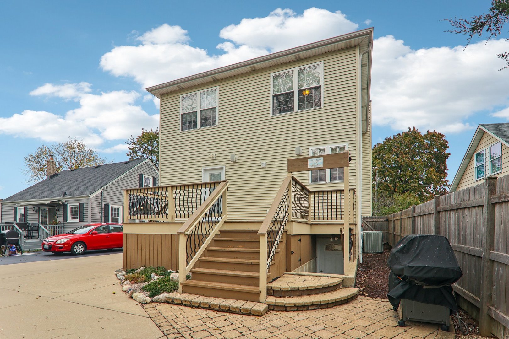 124 Hubbard Court Wauconda, IL 60084 - Photo 30 of 47 a front view of a house with a sink and potted plants