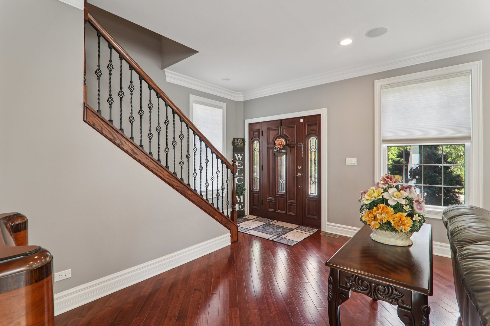 124 Hubbard Court Wauconda, IL 60084 - Photo 6 of 47 a view of a livingroom with furniture hardwood floor and a ceiling fan