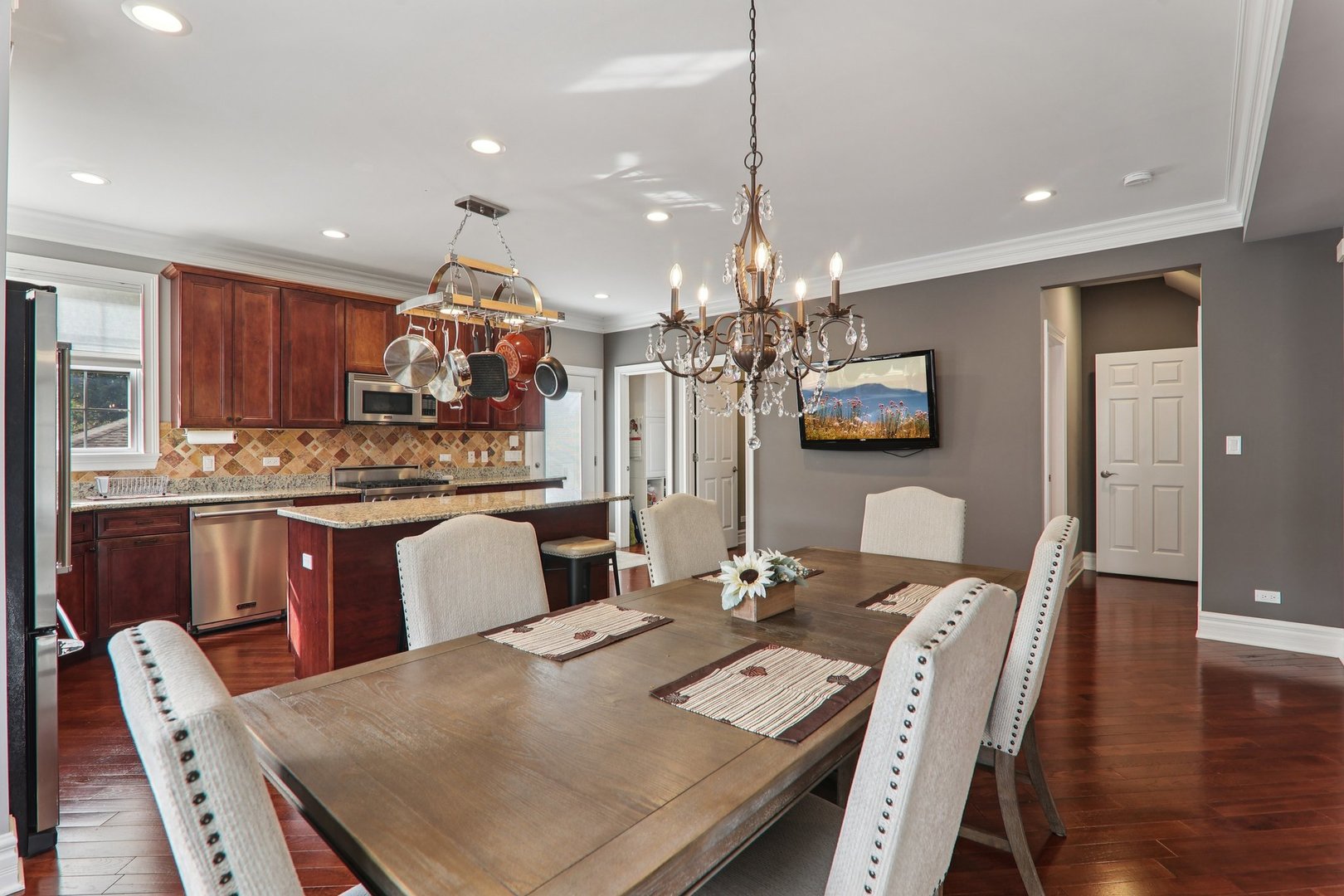 124 Hubbard Court Wauconda, IL 60084 - Photo 8 of 47 a large kitchen with a table and chairs