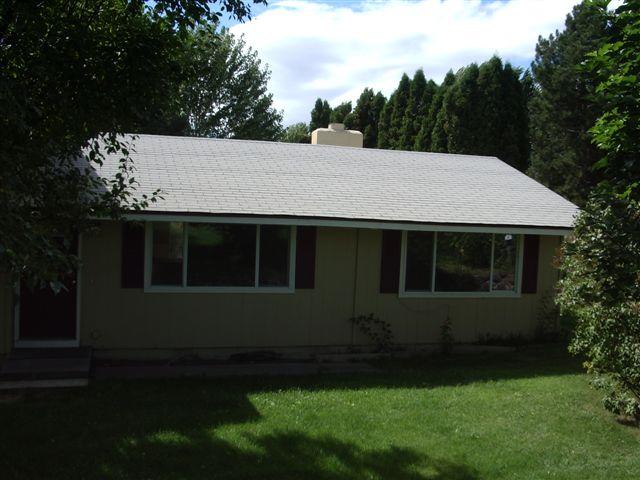 930 North Granger Road Granger, WA 98932 - Photo 2 of 19 a aerial view of a house with a yard