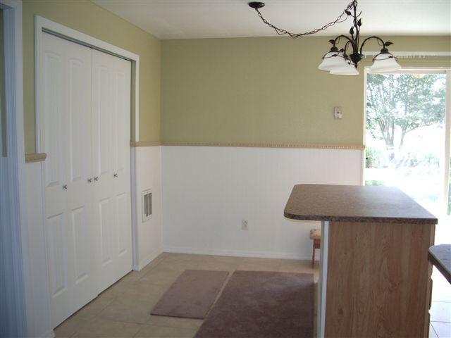 930 North Granger Road Granger, WA 98932 - Photo 13 of 19 a view of a room with a table and chairs