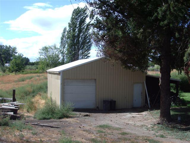 930 North Granger Road Granger, WA 98932 - Photo 6 of 19 a front view of house with yard