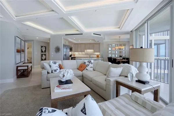 a living room with furniture or couch and a wooden floor