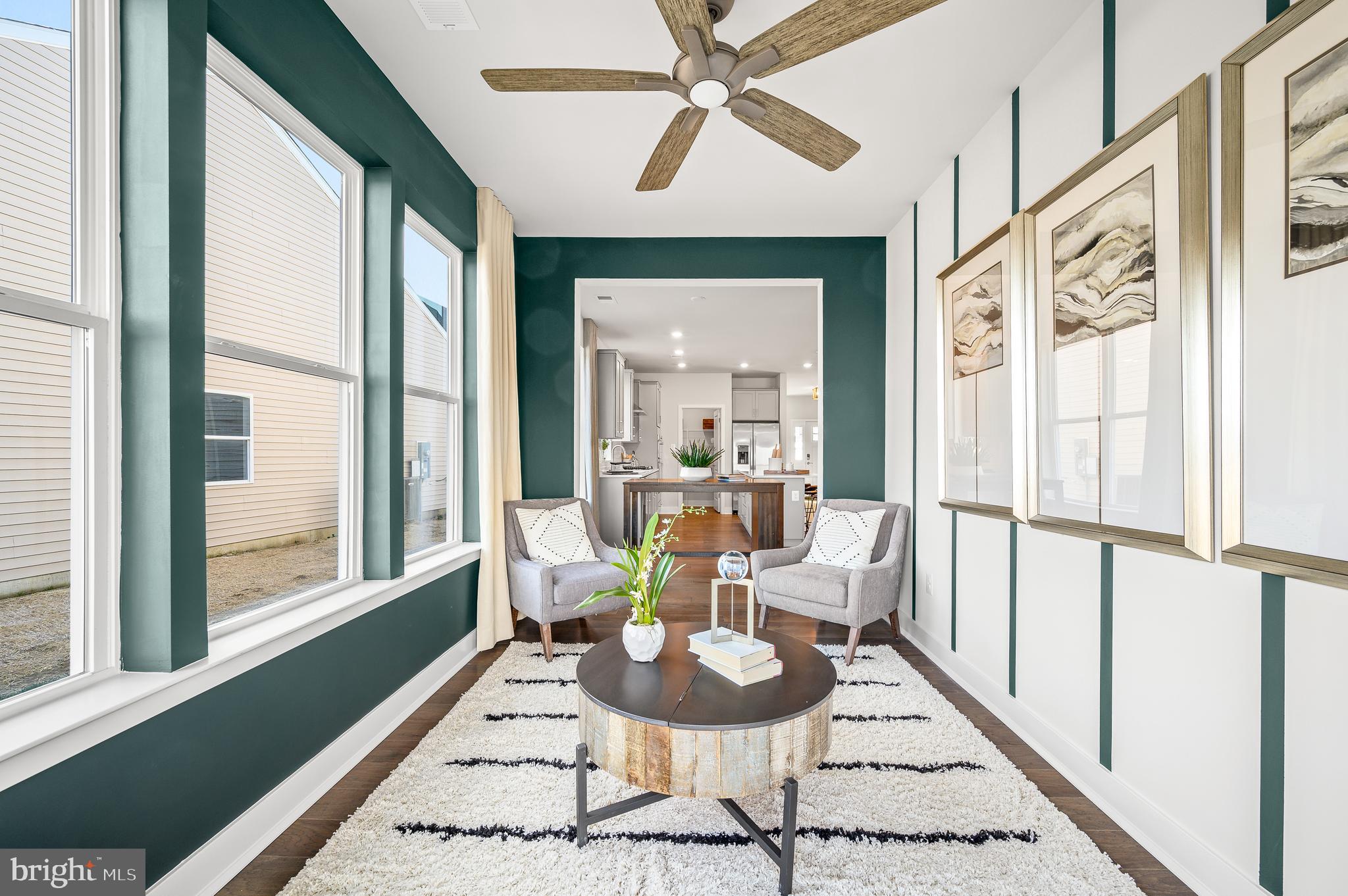 15 Saddleford Road Smyrna, DE 19977 - Photo 16 of 37 a view of a dining room with furniture window and wooden floor