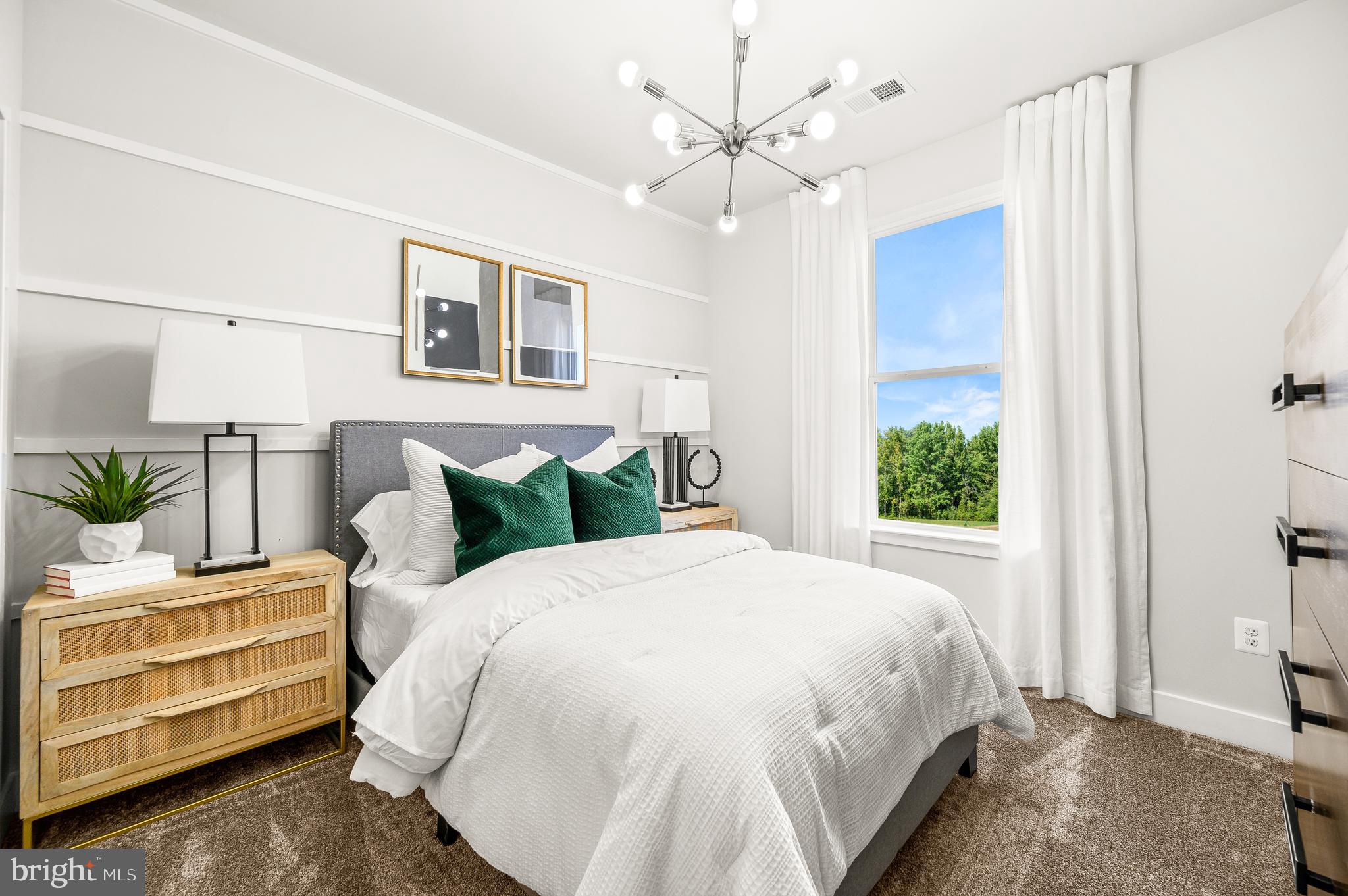 15 Saddleford Road Smyrna, DE 19977 - Photo 19 of 37 a spacious bedroom with a bed and a window
