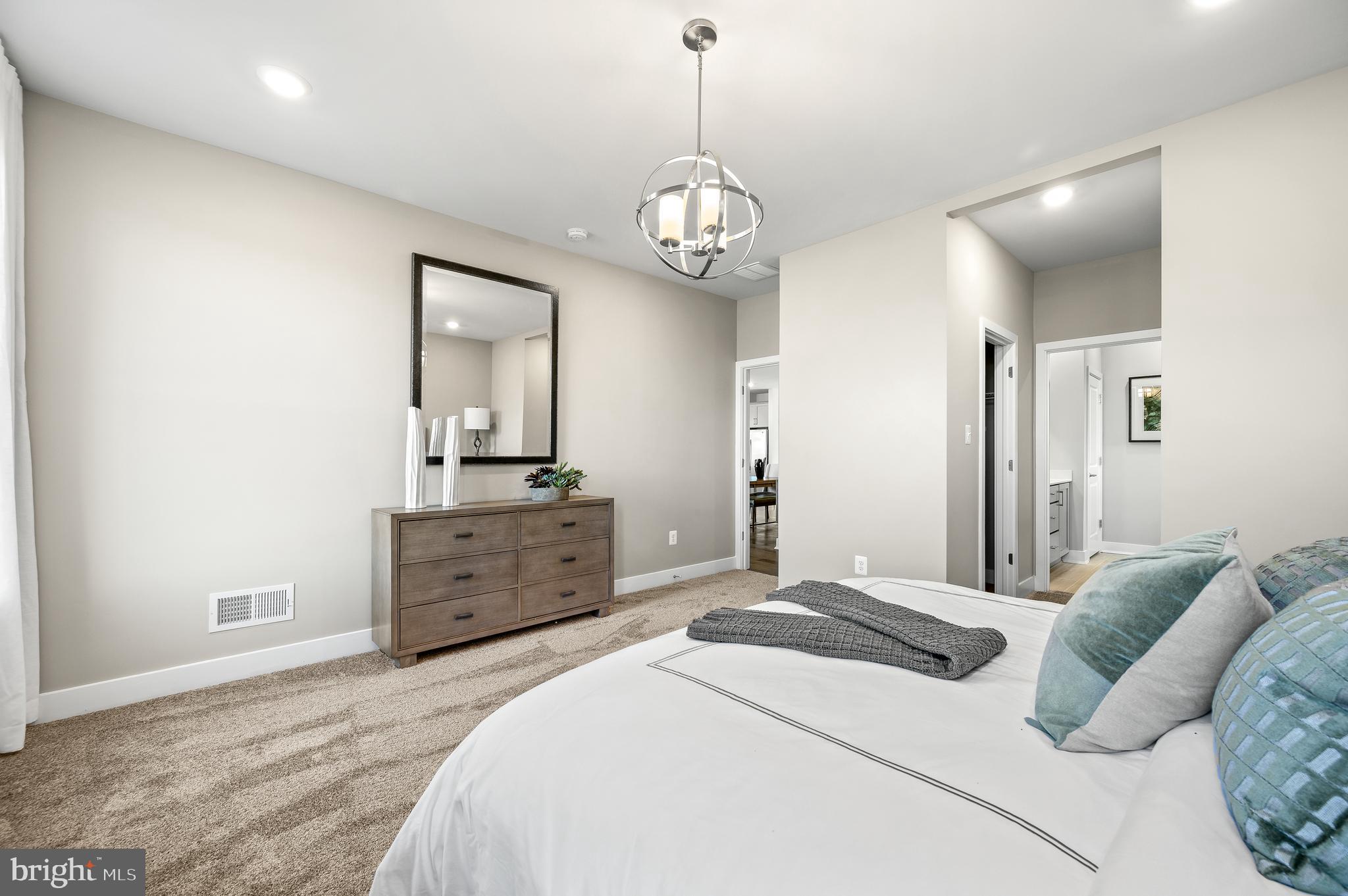 15 Saddleford Road Smyrna, DE 19977 - Photo 25 of 37 a bedroom with a bed and a dresser