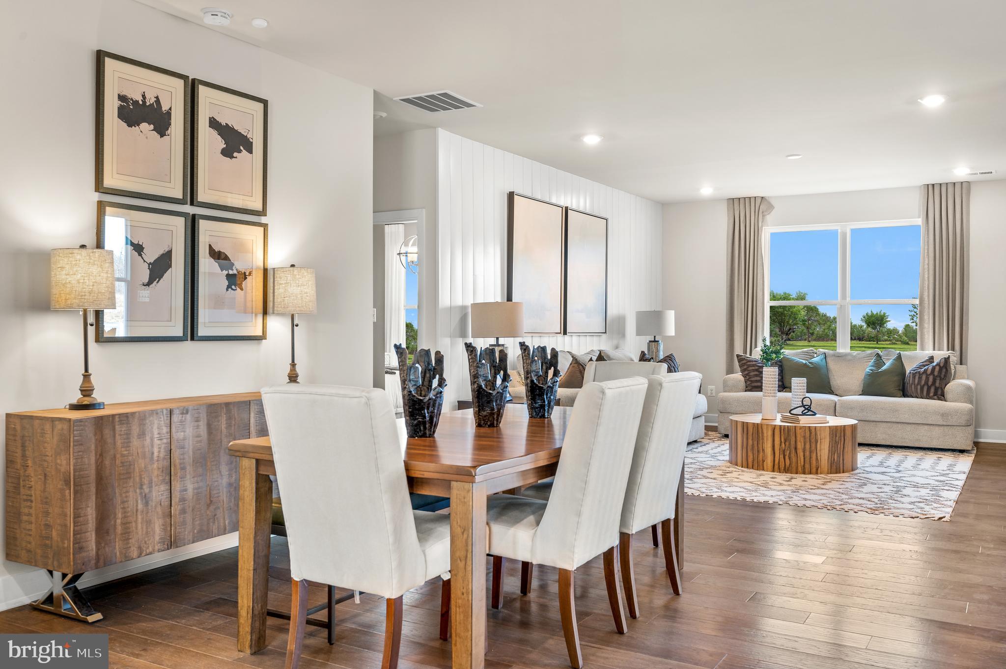 15 Saddleford Road Smyrna, DE 19977 - Photo 10 of 37 a view of a dining room with furniture window and wooden floor
